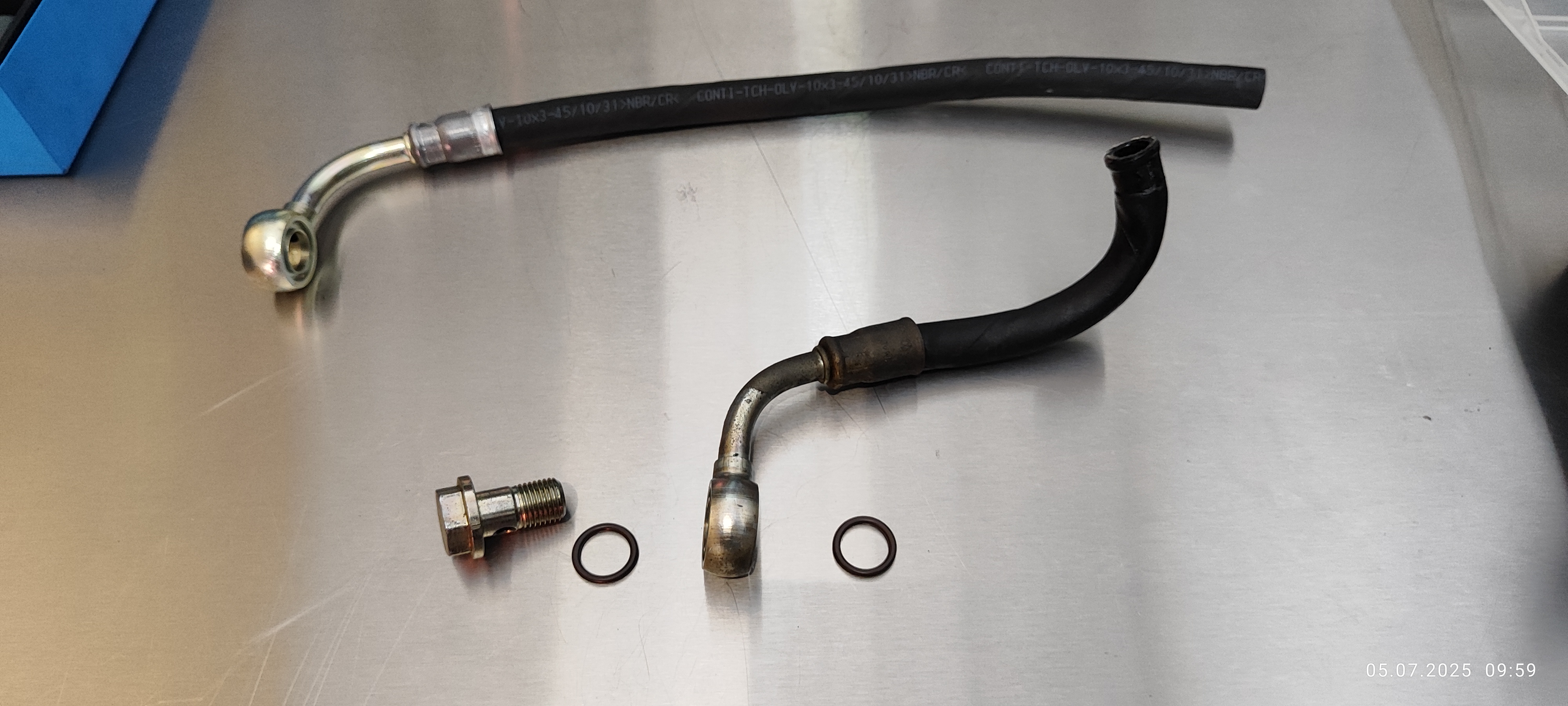 nachgerüsteten Hydraulikfilter für suboptimal erklärt und neuen Rücklaufschlauch eingebaut